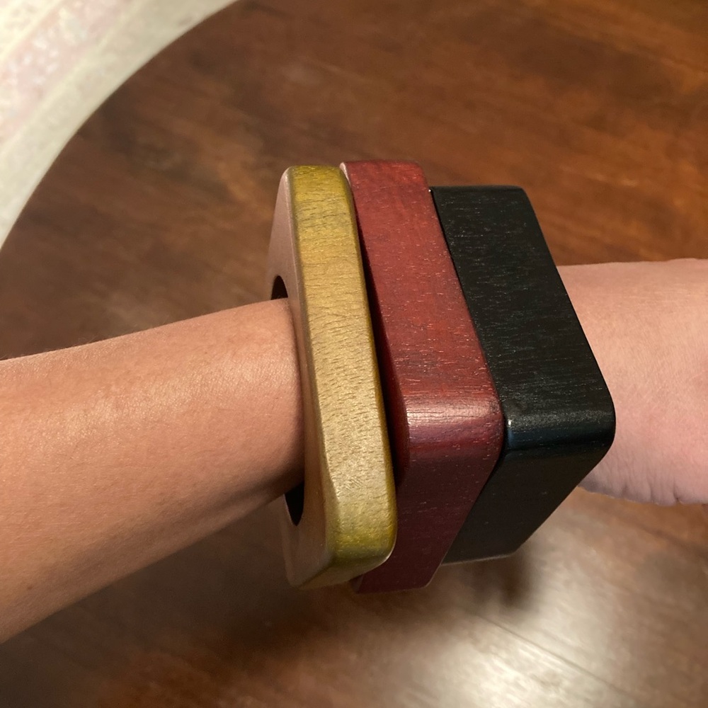 Set of three wooden bracelets. Wore them a few times.